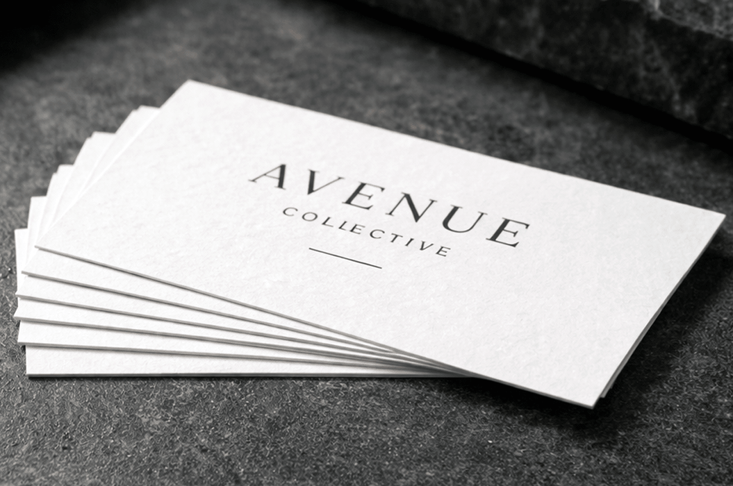 Letterpress business cards custom printed on 20pt white cotton stock with Avenue Collective debossed branding