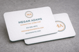 Two 20pt white cotton letterpress business cards with rounded corners
