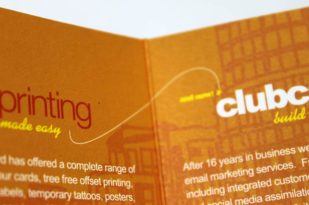 Close up of the inside of the folding business card printed in full color on 14pt uncoated stock for Clubcard | Business card is designed horizontally with the fold along the short side, and opens like a book | Clubcard Printing USA