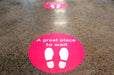 Custom floor sticker printing for social distancing on durable vinyl in full color for Low Tide Properties.